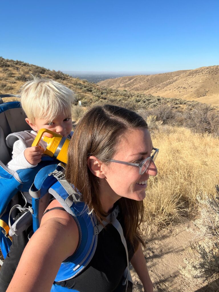 mom and baby in hiking carrier