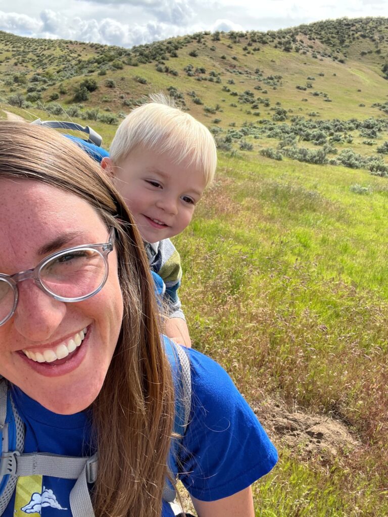 mom and baby in hiking carrier