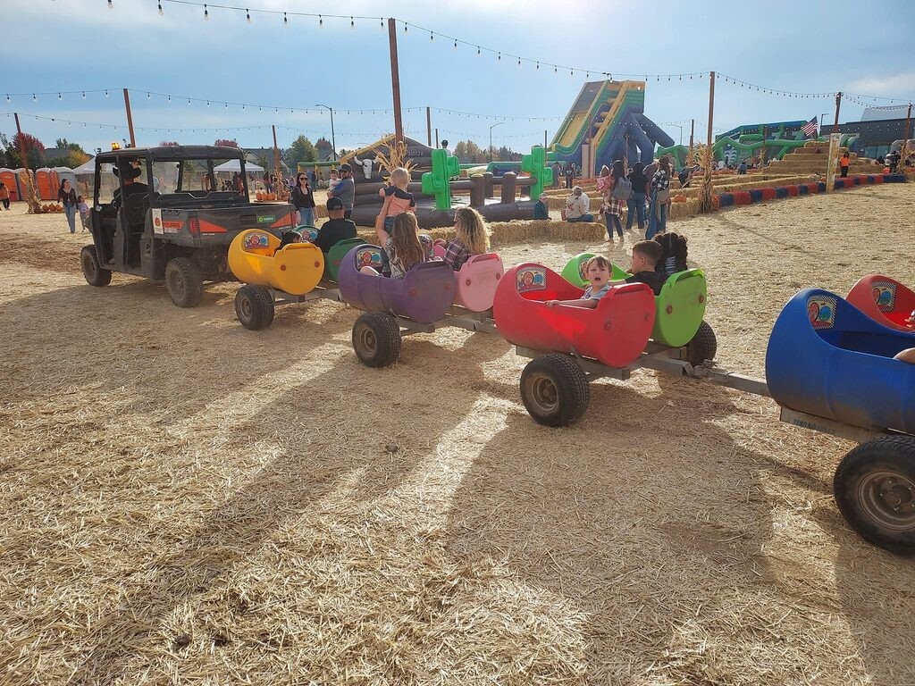 Kids in train cars at Pumpkin Palooza
